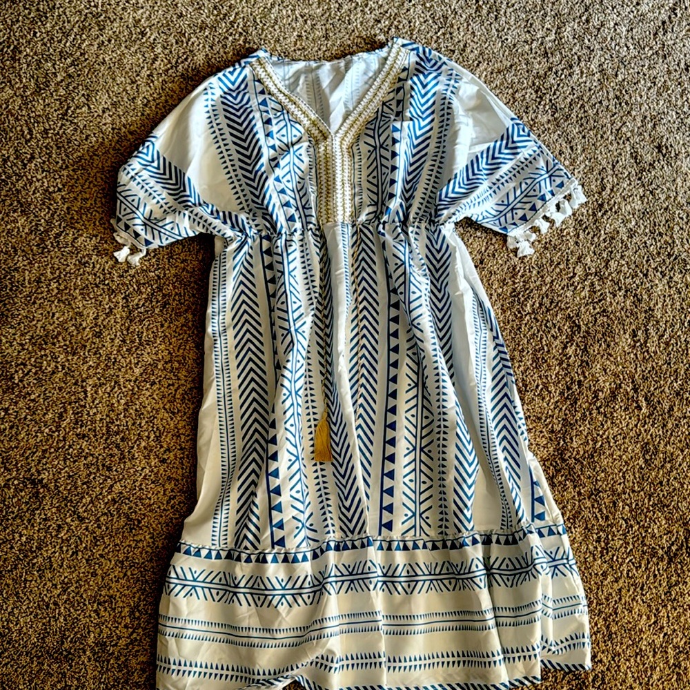 Woman’s Deep V-Neck Dress/Swimsuit Coverup